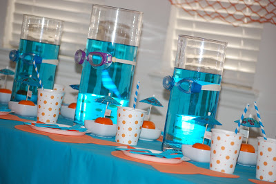 Orange and turquoise create a splash of color to this Under The Sea Party Kids Birthday Party! Including cute dessert table, place cards and party favors!