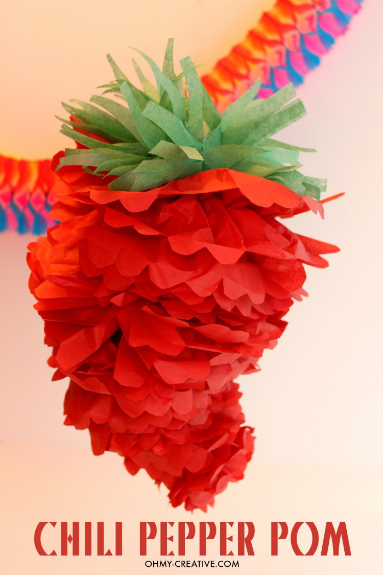 Chili Pepper Party Pom for Cinco de Mayo or a Mexican Fiesta! So cute and cheap to make using tissue paper! | OHMY-CREATIVE.COM