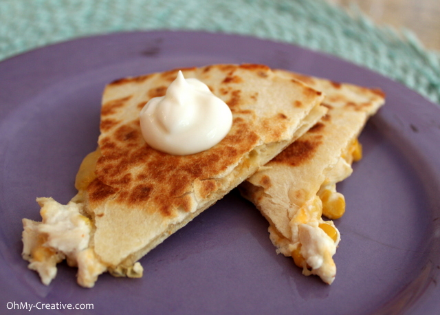 Yum is the word for these Goat Cheese & Corn Salsa Chicken Quesadilla - a family favorite or yummy appetizer  |  OHMY-CREATIVE.COM