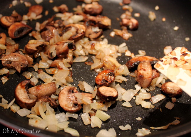 Sautéing mushrooms and onions in a skillet 