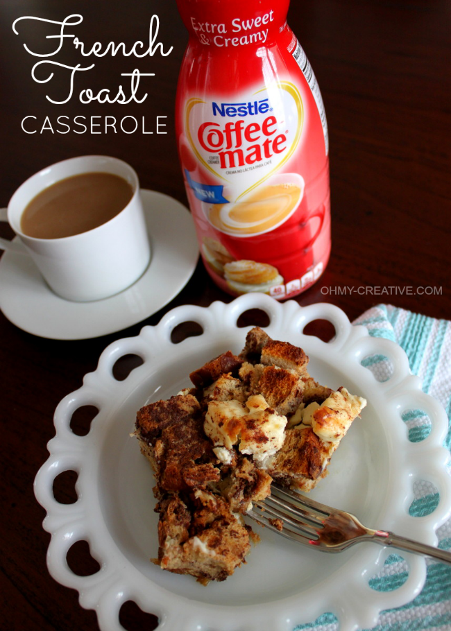French Toast Casserole served with a cup of coffee and a white coffee cup.