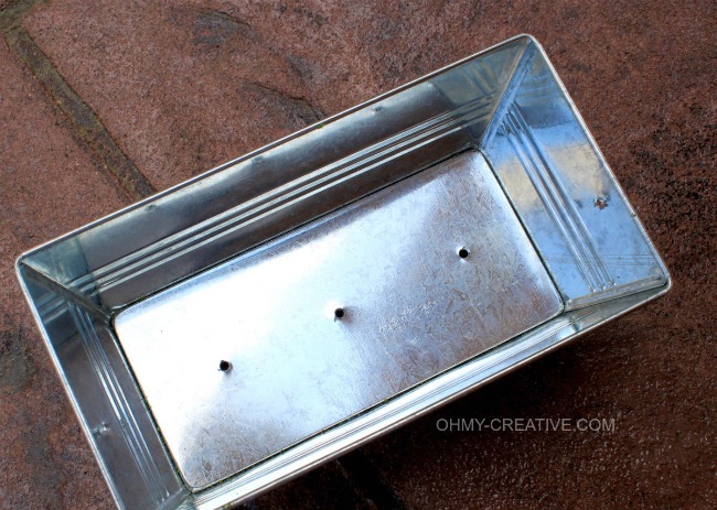 Tin with drilled holes