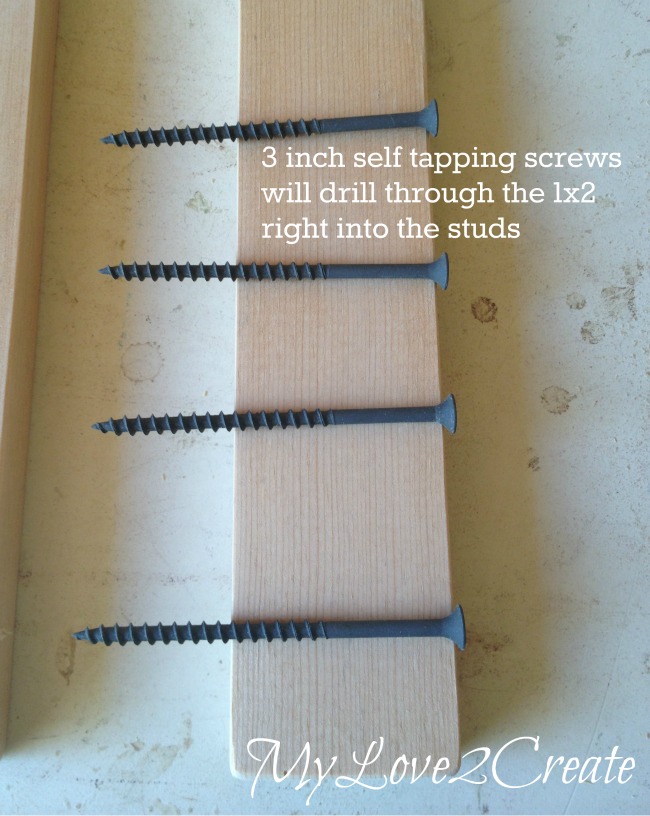 long screws to attach magazine rack to studs in wall
