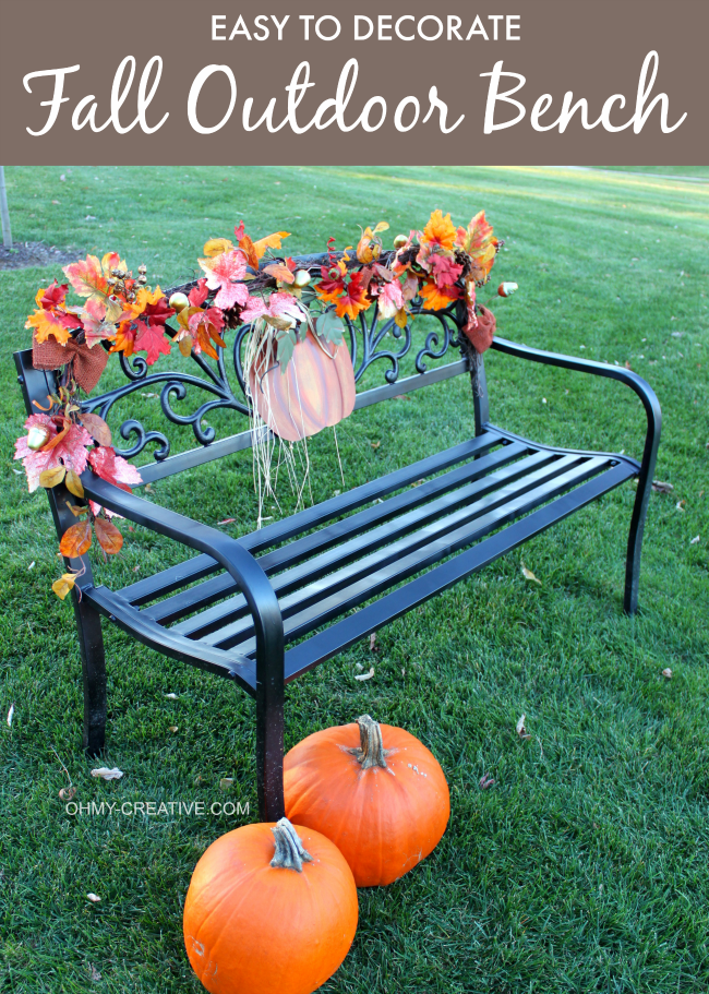Use a pretty garland and metal pumpkin to create this easy to Decorate a Fall Outdoor Bench | OHMY-CREATIVE.COM