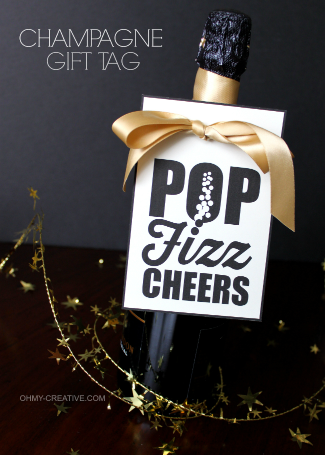 Free Printable Champagne Gift Tag - Pop Fizz Cheers! Perfect for hostess gifts, New Year's Eve and all of life's celebrations! | OHMY-CREATIVE.COM 
