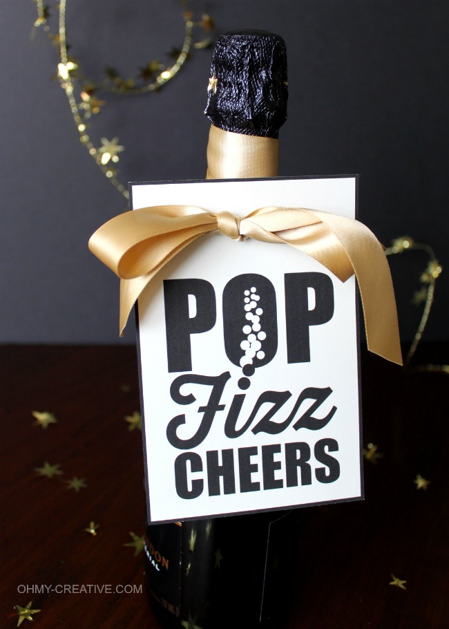 Free Printable Champagne Gift Tag - Pop Fizz Cheers! Perfect for hostess gifts, New Year's Eve and all of life's celebrations! | OHMY-CREATIVE.COM 