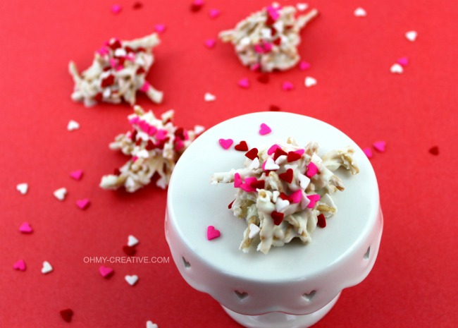 A cute Valentine's twist on a favorite cookie! White Chocolate Valentine Haystacks Cookies | OHMY-CREATIVE.COM 