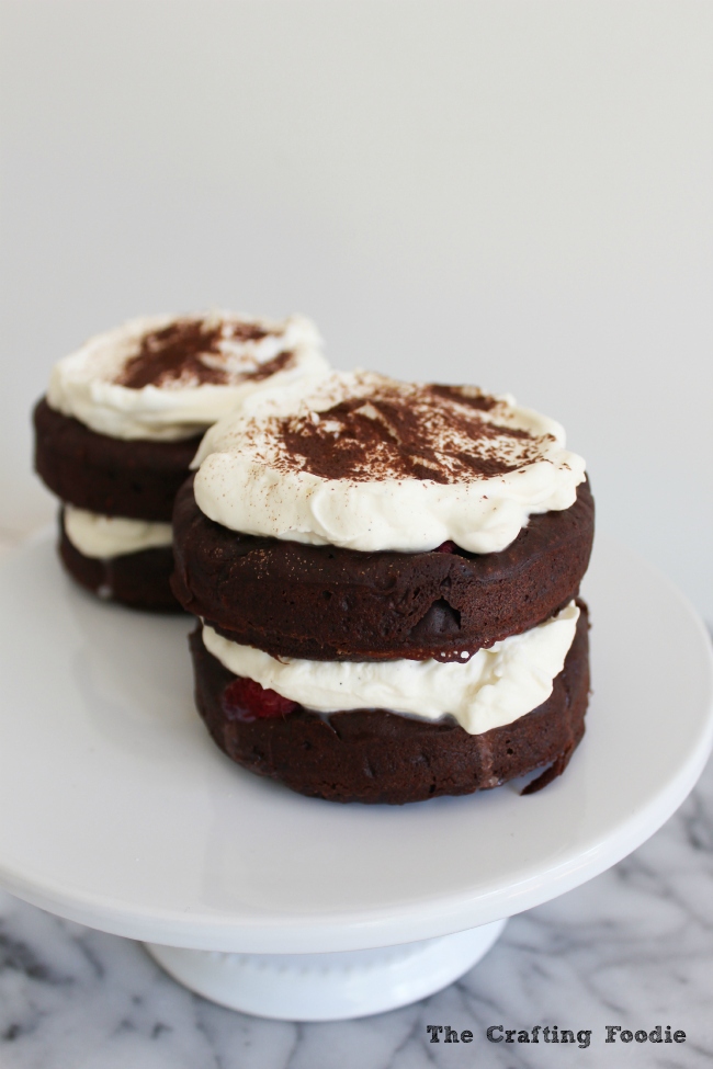 Mini-Brownie Cakes made with two, fudgy brownie layers studded with fresh raspberries and filled with lightly sweetened, fresh whipped cream. Need I say more! |The Crafting Foodie via OHMY-CREATIVE.COM