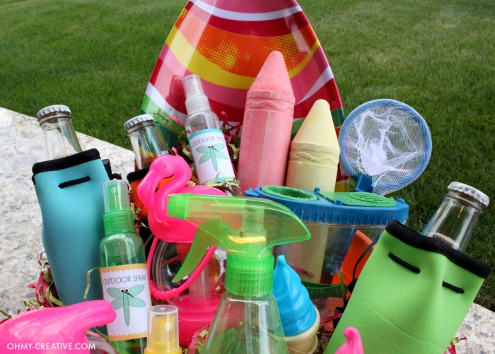 Do you need some ideas on what to bring for a summer hostess gift? Here is a super easy Summer Party Gift Basket you can put together in minutes with one trip to the dollar store! Fun ideas for fun outdoor actives!  |  OHMY-CREATIVE.COM