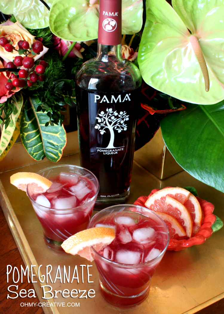 Do you love summer entertaining?! This Pomegranate Sea Breeze made with PAMA Liqueur is a light refreshing cocktail to serve for all summer celebrations! Yum! | OHMY-CREATIVE.COM