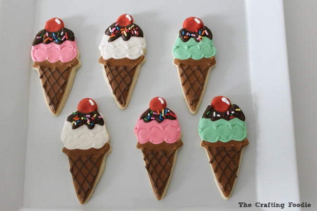 This whimsical set of Ice Cream Decorated Cookies starts with a soft, delicious sugar cookie base, and they're decorated with colorful royal icing. These cookies have all the fun of ice cream without any of the melted mess!  The Crafting Foodie for OHMY-CREATIVE.COM