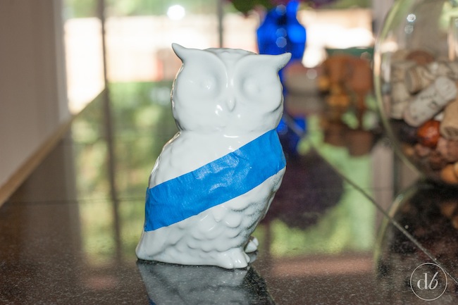 This Painted Dipped Owl can be created from any thrift store find. All it takes is two colors of spray paint, painters tape and it can be done in a few quick easy steps! Dwell Beautiful for OHMY-CREATIVE.COM