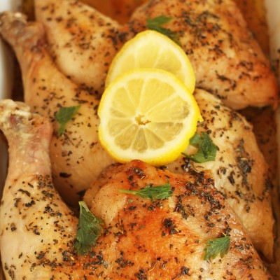 Easy to make Basil Baked Chicken Legs topped with butter I Oh My Creative