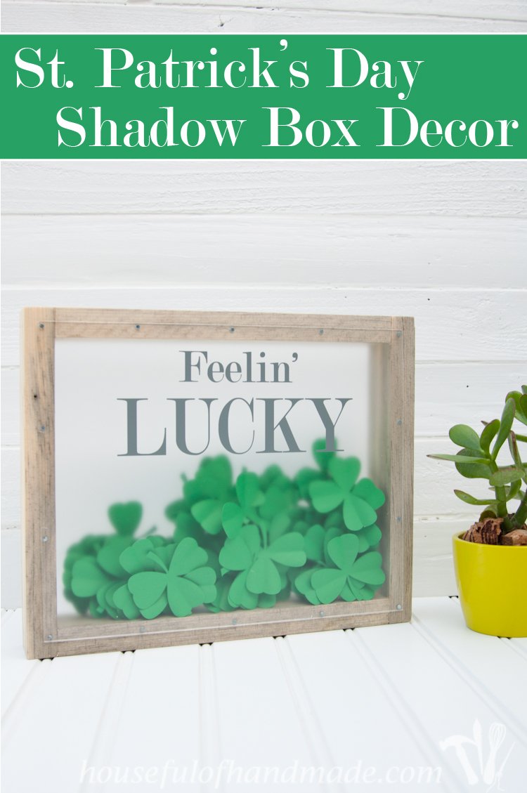 Make a beautiful shadow box full of clovers for a fun St. Patrick's Day shadow box decor idea. See if you can find the 1 4 leaf clover in the bunch. | OhMy-Creative.com