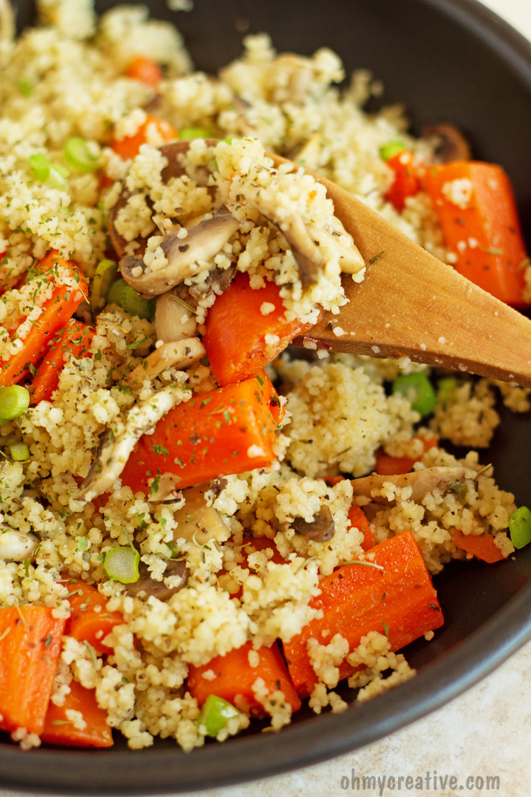 This Mushroom Mediterranean Couscous Recipe with carrots is sauteed with lemon juice and garlic. A meatless, quick and delicious dinner idea or side dish! Add it to your vegetarian recipes! Popular Pins by OHMY-CREATIVE.COM