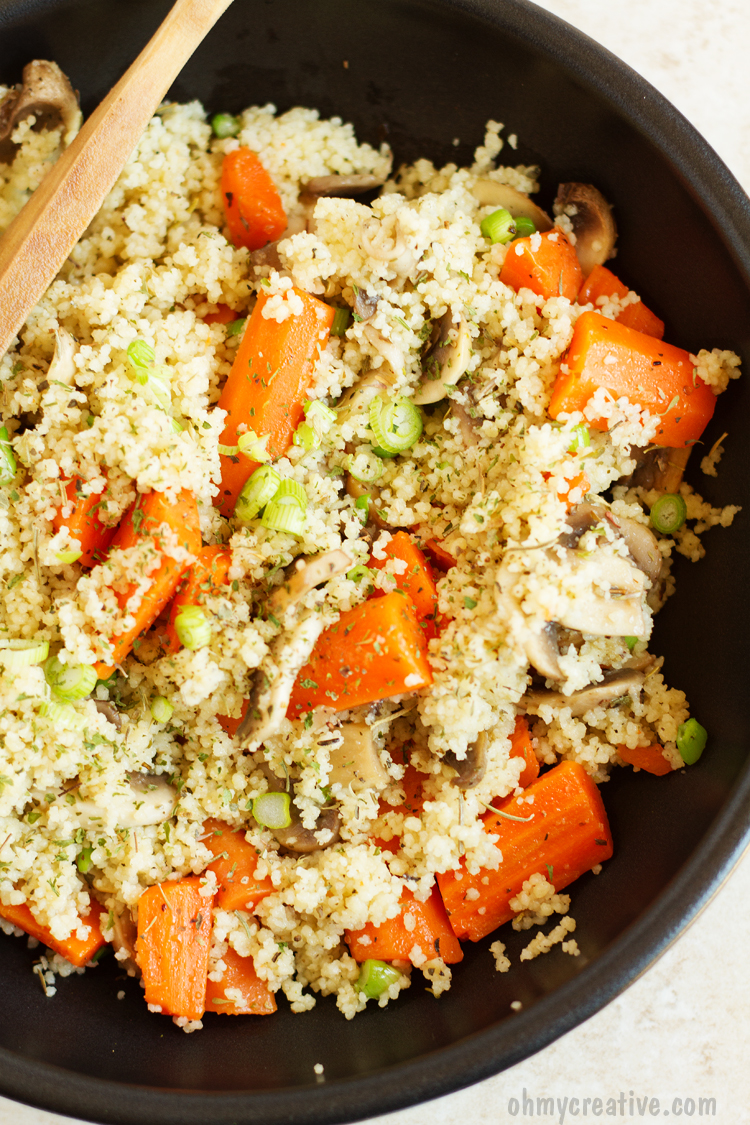 This Mushroom Mediterranean Couscous Recipe with carrots is sauteed with lemon juice and garlic. A meatless, quick and delicious dinner idea or side dish! Add it to your vegetarian recipes! Popular Pins by OHMY-CREATIVE.COM