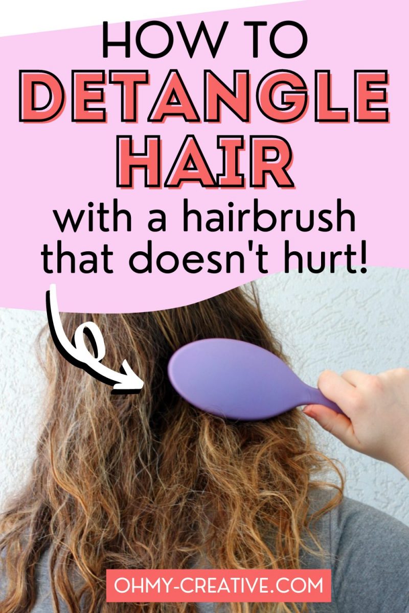 Girl trying to detangle wet hair with a hairbrush. 