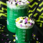 These Mad Scientist Halloween Kids Drinks served in a beaker is a spooktacular party drink! A fun green drink for kids at Halloween or for a Mad Scientist Party! | OHMY-CREATIVE.COM