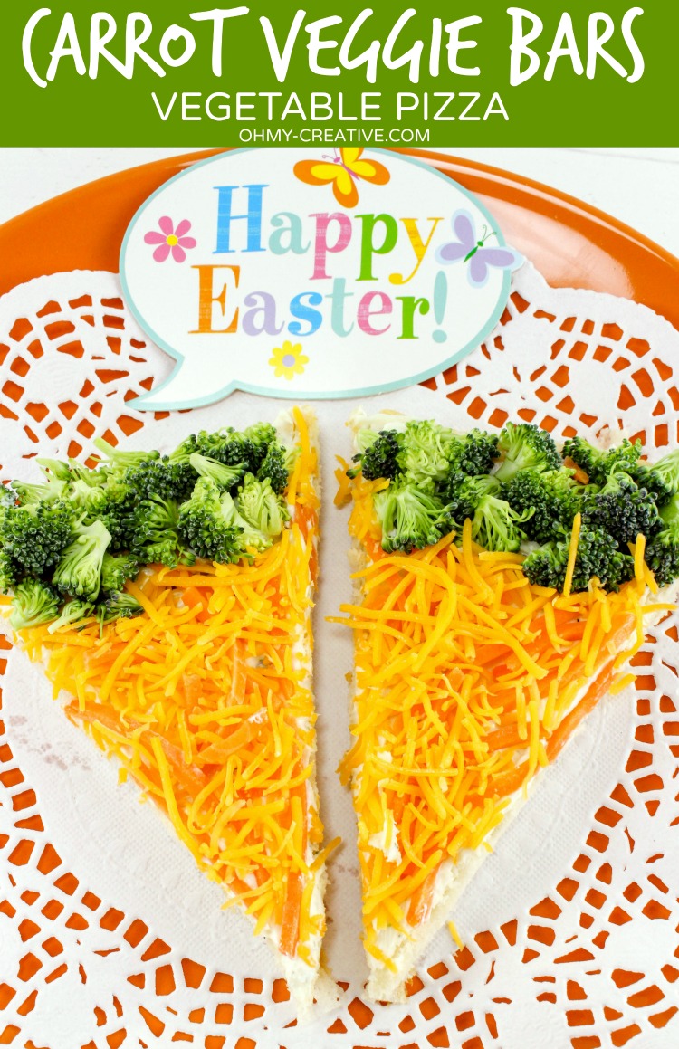 Carrot Vegetable Pizza Recipe with an Easter twist! Chopped veggies with a Crescent Roll crust make these veggie bars a fun Easter appetizer or brunch menu item. | OHMY-CREATIVE.COM | carrot | carrot appetizer | side dish recipe | crescent rolls | cheese | broccoli | Easter recipe | Easter brunch