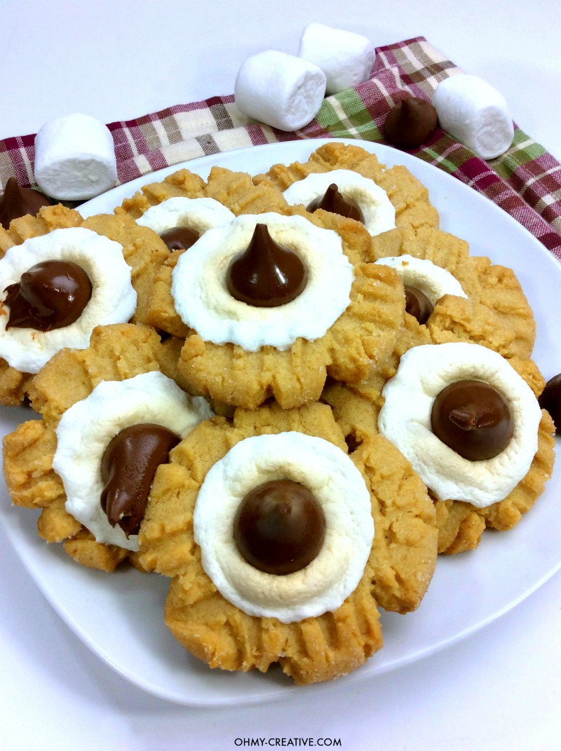 S'mores Hershey Kiss Cookies Recipe | OHMY-CREATIVE.COM | S'mores Cookies | Peanut Butter Blossom Cookies | Smores Dessert | Marshmallow Cookies | Peanut Butter Kisses 