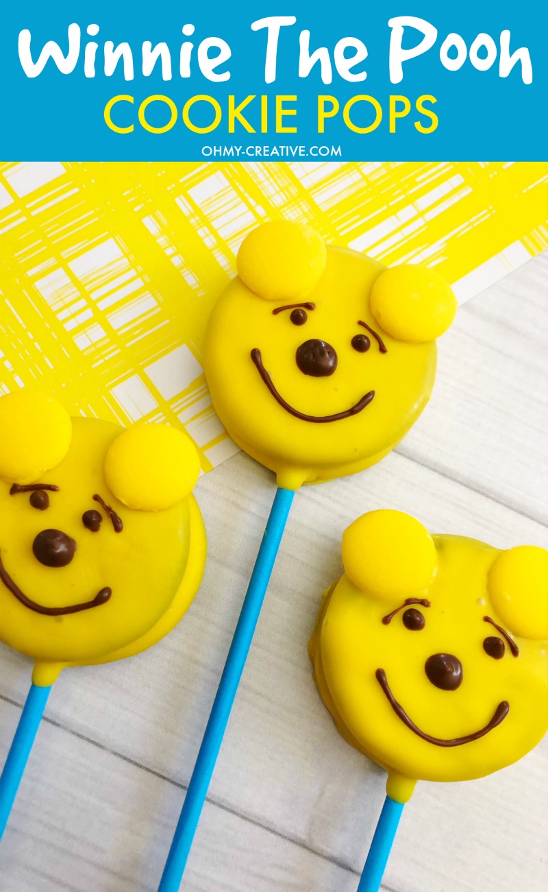 These Disney Winnie the Pooh Cookies Oreo Pops are an adorable Pooh Bear treat! OHMY-CREATIVE.COM | Winnie the Pooh | Winnie the Pooh Pops | Oreo Pops | Winnie the Pooh Cookies #winniethepooh #winniethepoohmovie #winniethepoohcookies #oreopops #disney