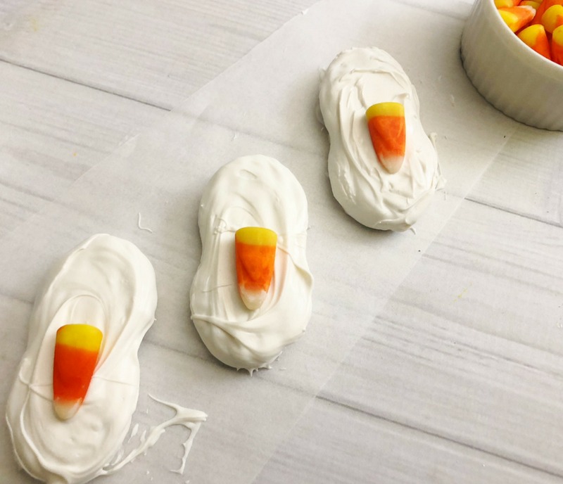 Add candy corn to your Scarecrow nutter butter fall cookies to create a cute nose