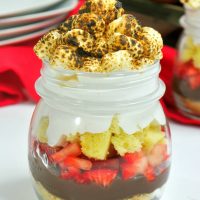 The best S'mores Strawberry Shortcake In A Jar - easy to serve for parties! OHMY-CREATIVE.COM | Strawberry S'mores | strawberry shortcake with pound cake | strawberry shortcake dessert | #strawberryshortcake #strawberrysmores #smores #dessertrecipe #inajar #strawberryshortcakeinajar