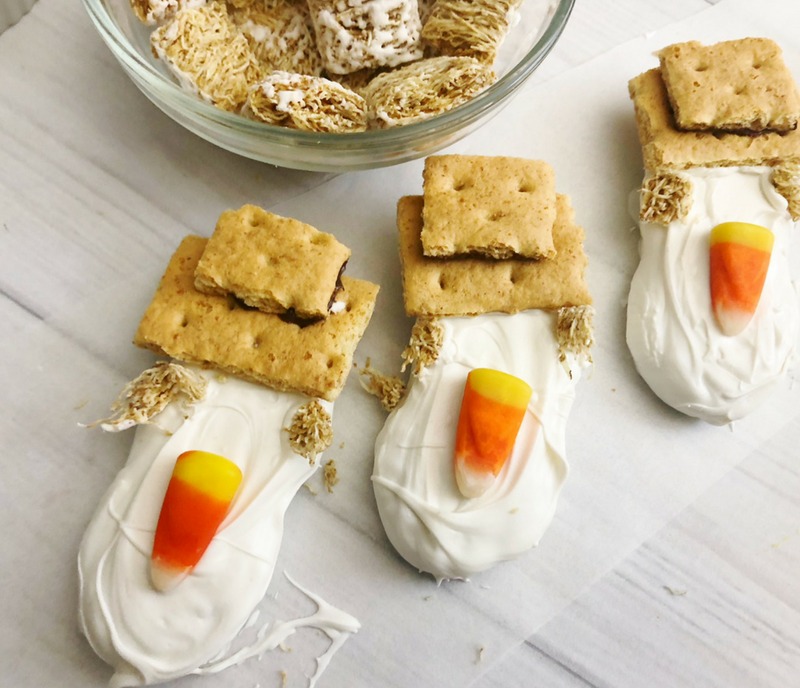 Create a hat for your scarecrow cookie by using shredded wheat and graham crackers. Check out our Cute Scarecrow Nutter Butter Fall Cookies for your harvest fest or Thanksgiving dessert buffet table! #Scarecrow #Scarecrowdessert #fallcookie #falldessert #thanksgivingdessert #nutterbutter 