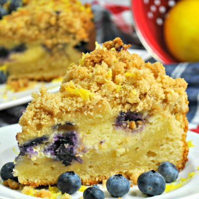 Create a delicious Lemon Blueberry Cake Recipe complete with a cream cheese layer and delicious crumb topping all in your Instant Pot or pressure cooker! A delicious light dessert that is beautiful and easy to assemble! #instantpotrecipe #pressurecookerrecipe #lemonblueberrycakerecipe #lemonblueberrycrumbcake