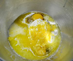 Mixing cream cheese filling for lemon blueberry cake recipe