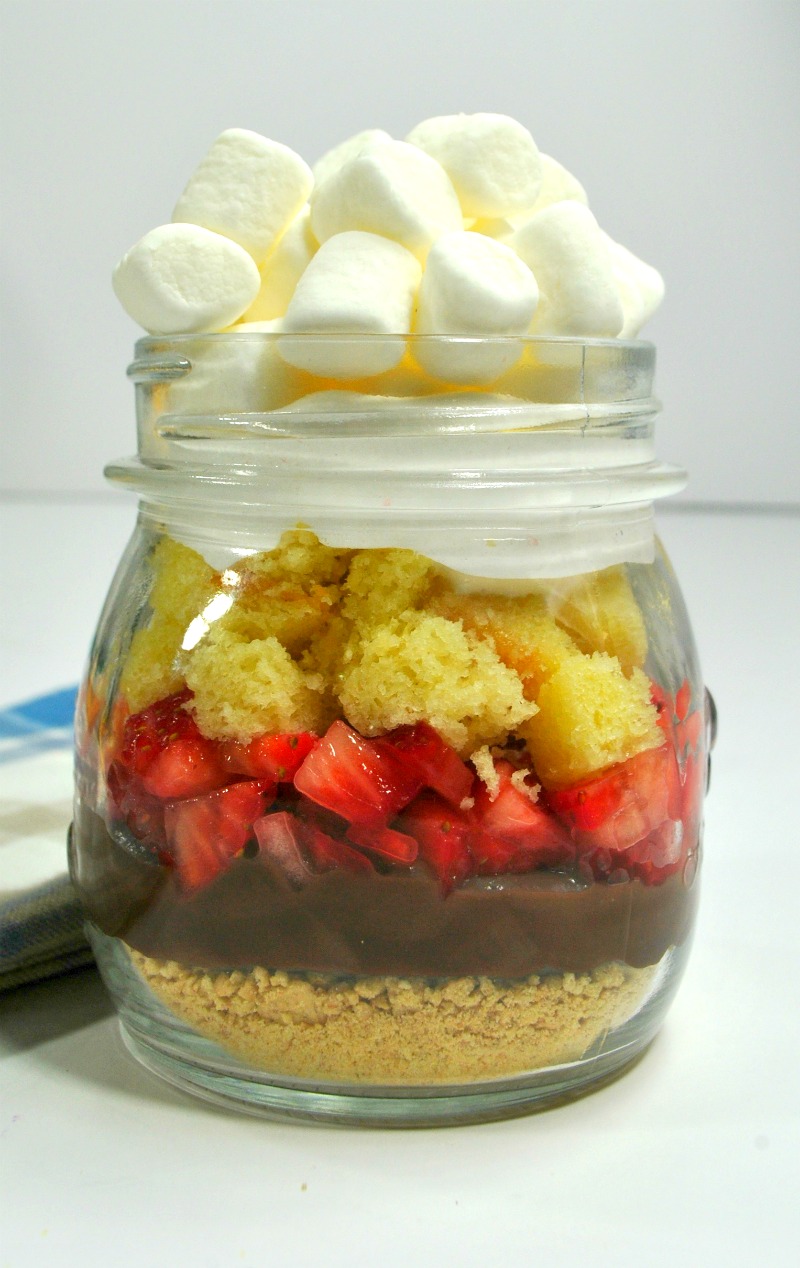 The best S'mores Strawberry Shortcake In A Jar - easy to serve for parties! OHMY-CREATIVE.COM | Strawberry S'mores | strawberry shortcake with pound cake | strawberry shortcake dessert | #strawberryshortcake #strawberrysmores #smores #dessertrecipe #inajar #strawberryshortcakeinajar 