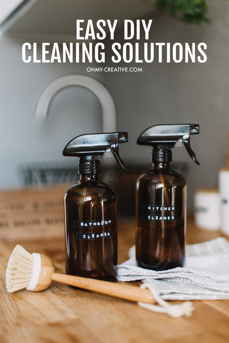Instead of stocking up on over-the-counter cleaning supplies loaded with toxic chemicals, how about putting together a few DIY household cleaners that are all-natural, inexpensive, effective and smell great. OHMY-CREATIVE.COM #diycleaningproducts #chemicalfreecleaningproducts #homemadelaundrydetergent #diytoiletcleaner #diycleaner #homemadeglasscleaner #homemadecleaner #homemadecarpetcleaner