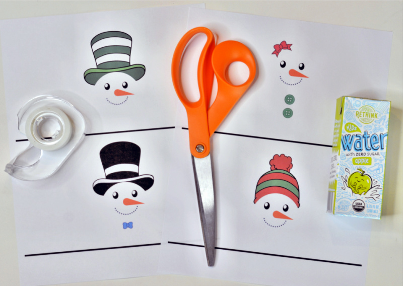 These Free Printable Snowman Juice Box Covers are a perfect accent to cover kids juice boxes for Christmas parties or any winter party festivities! OHMY-CREATIVE.COM #juiceboxcovers #printablejuiceboxcovers #snowmanprintable #christmasprintable #winterprintable 