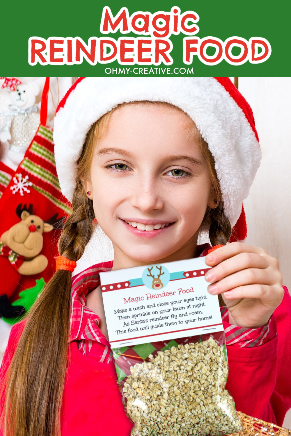 A girl dressed red and a Santa hat holding up a bag of Magic Reindeer Food