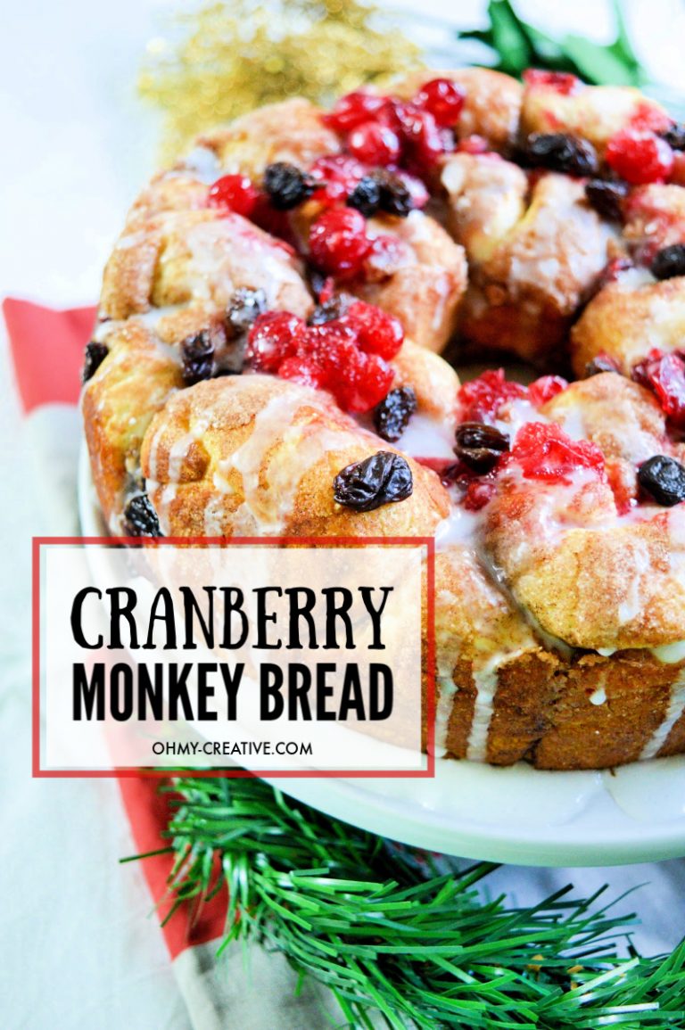 baked cranberry raisin monkey bread on a white plate