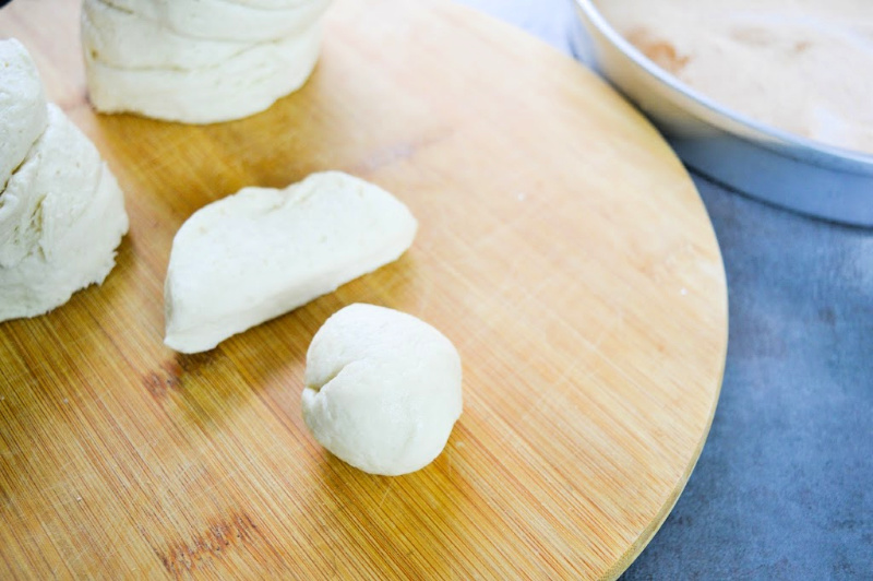 How to cut and roll dough for monkey bread on a cutting board