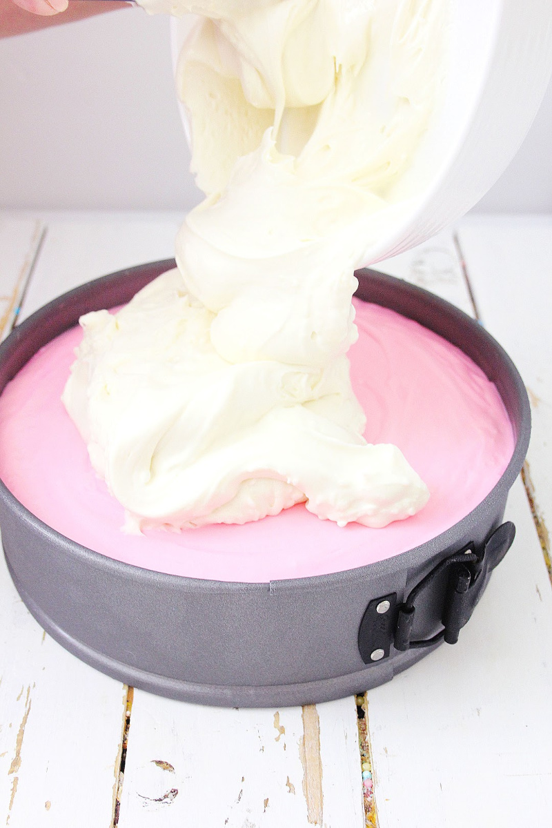 Once cheesecake filling is set, spoon on whipped cream on top.
