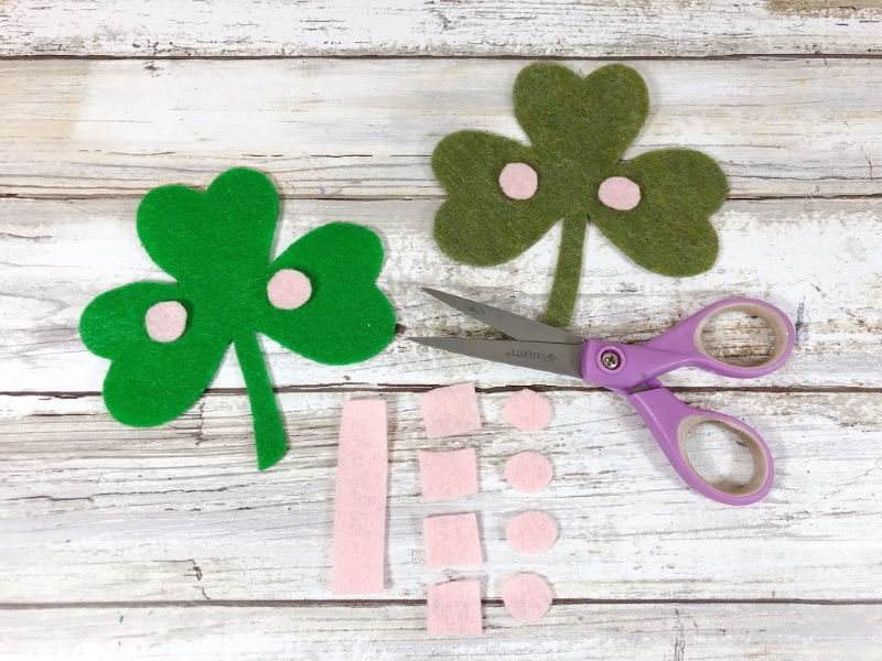 Cut circles from pink felt for the pink checks on the felt shamrocks.