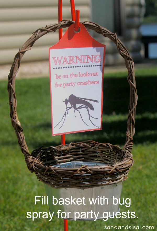 This outdoor party bug spray basket attache to a garden hook is a must for summer evening entertaining.