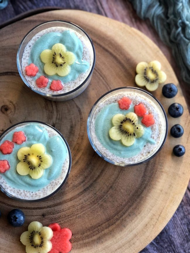 Not only are these unicorn chia puddings a cinch to make, they are also refined sugar free, healthy and oh so pretty. Fruit cut into flower shapes decorate these pretty chia puddings.