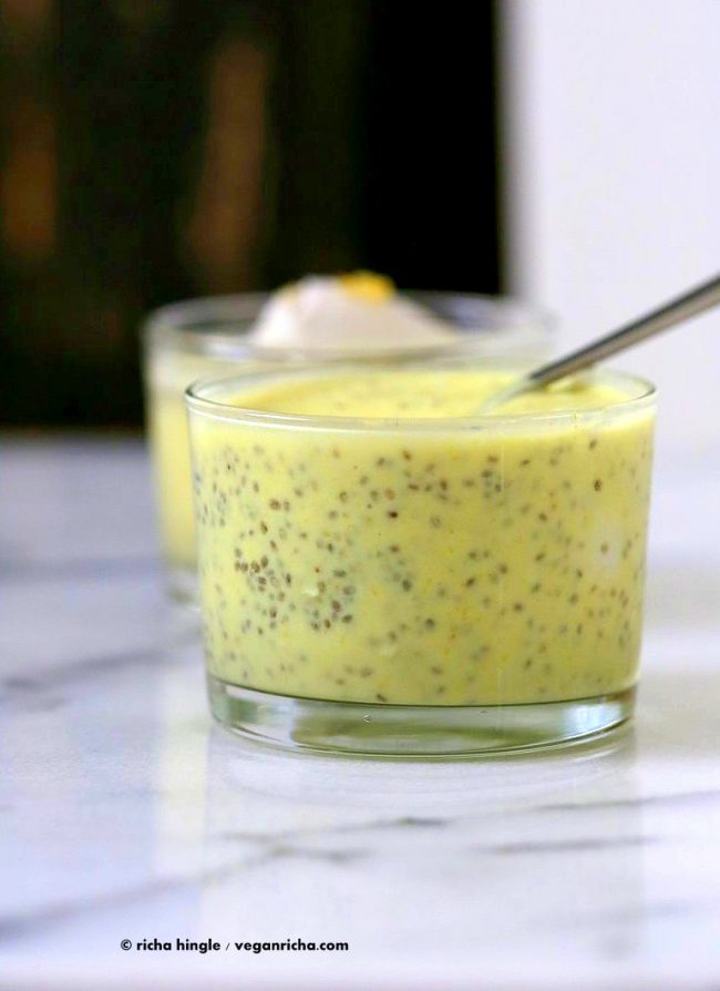 Lemon chia pudding with a spoon in it.