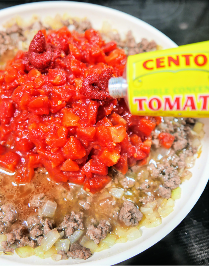 Add tomato past to the ingredients before mixing.