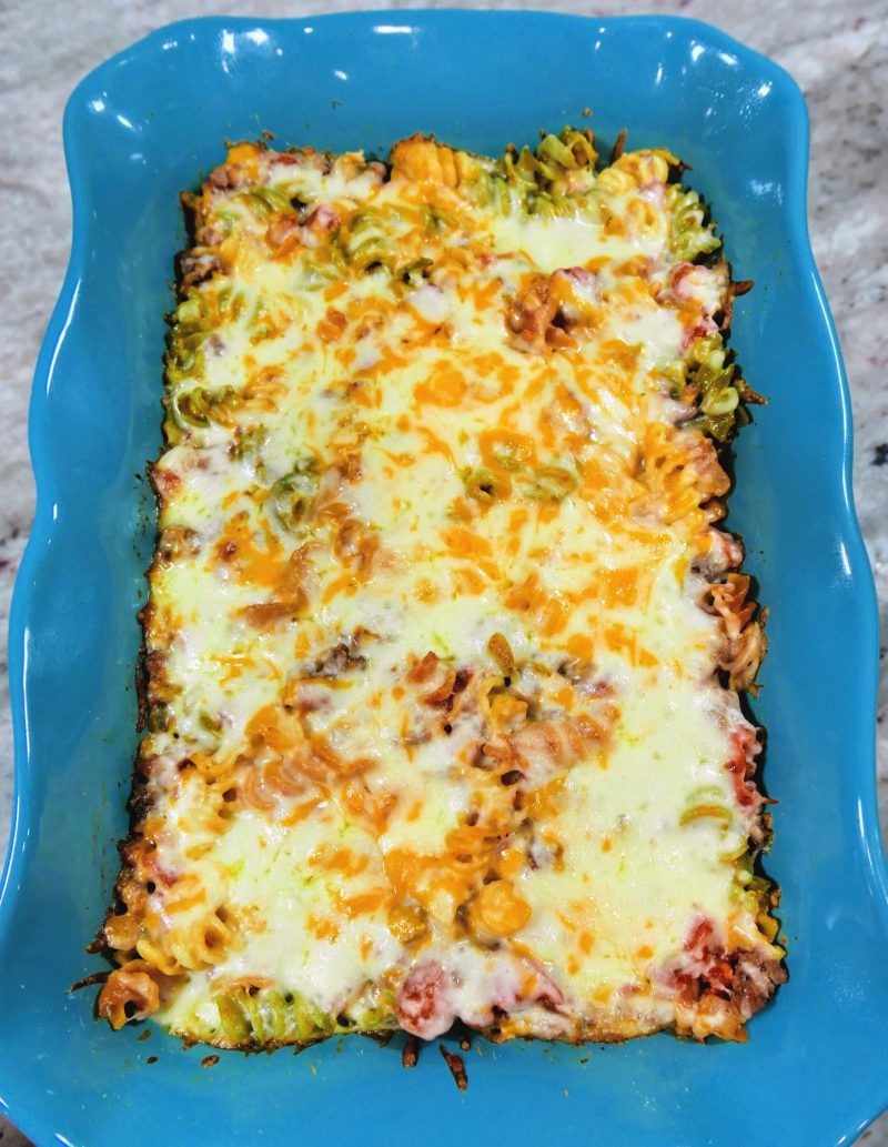 This cheeseburger casserole is served in a pretty baking dish - a great budget family meal.