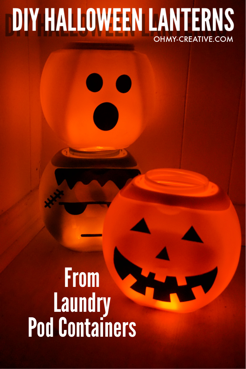 Stacked Halloween lanterns glowing with tealights place inside.