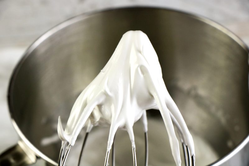 Perfect whipped meringue on the beater of the stand mixer.