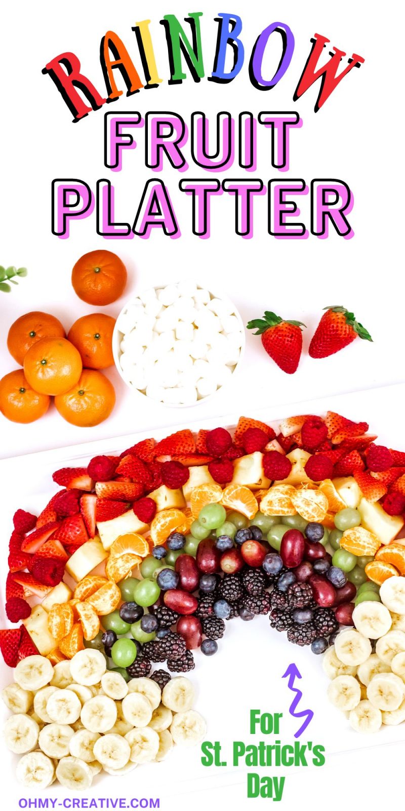 Assembled Rainbow fruit platter with bananas as the clouds. A bowl of marshmallows is also pictured as and option for clouds.