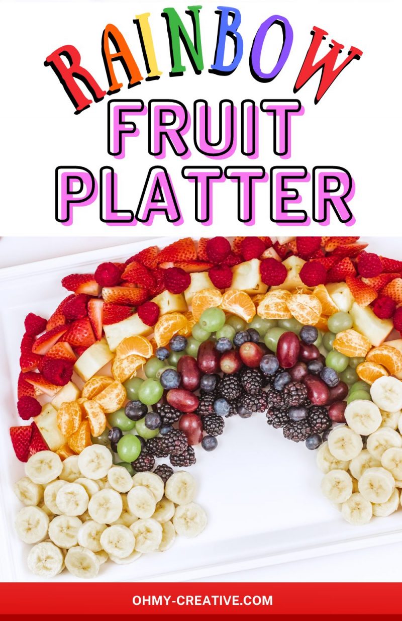 Finished Rainbow fruit platter with bananas as the clouds. A bowl of marshmallows is also pictured as and option for clouds.