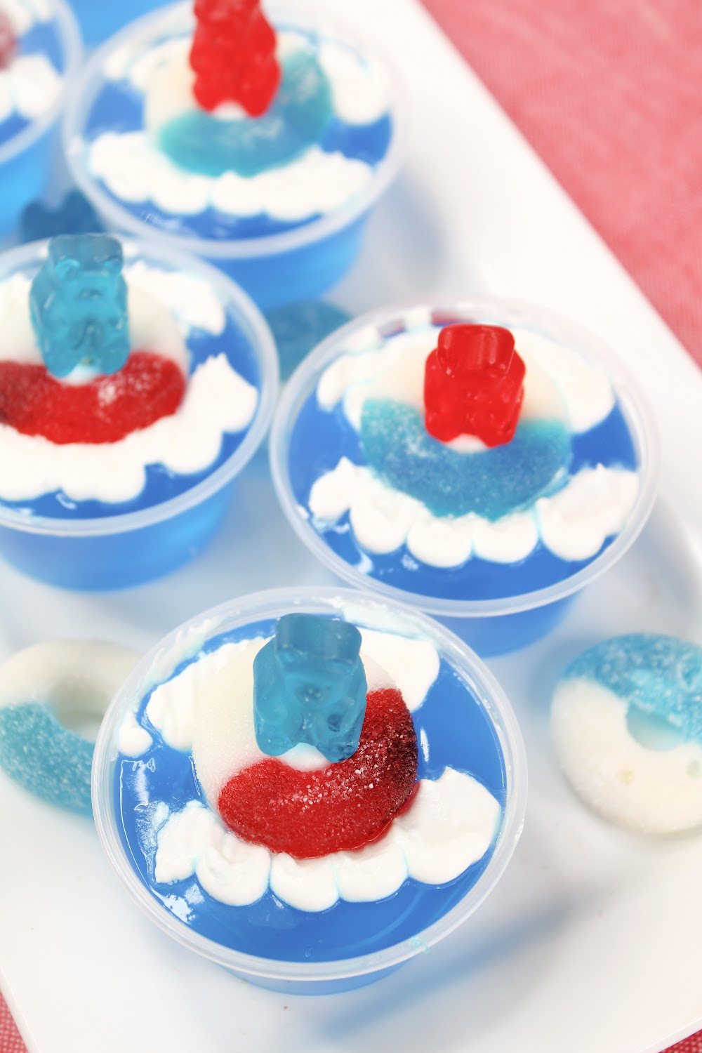 Fun pool party jello shots using gummy bears in red, white and blue!