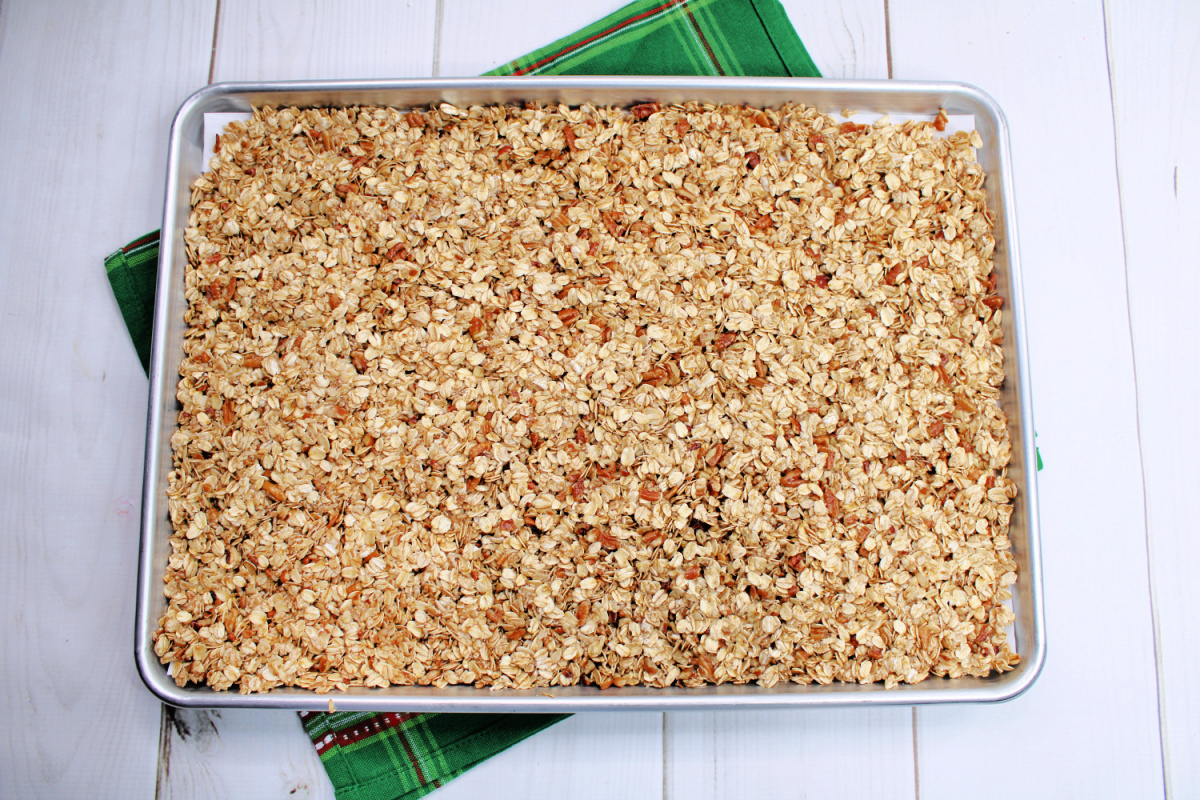Pour the oat mixture on the prepared baking pan.