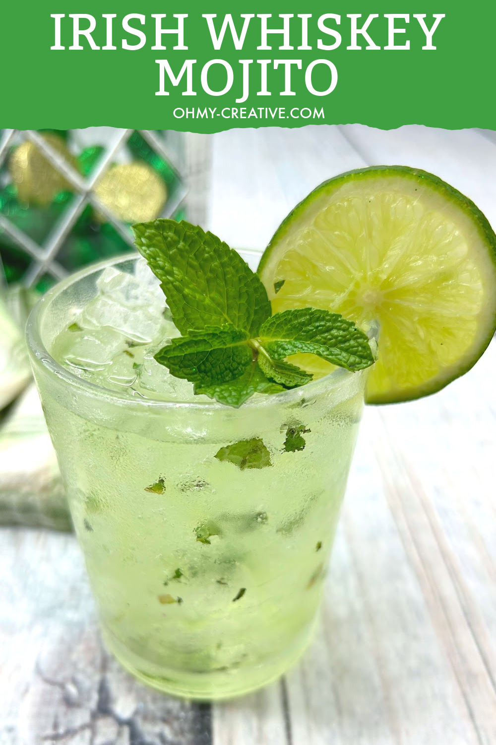 Green Irish Mojito recipe garnished with fresh mint and a slice of lime made with Jamison whiskey.
